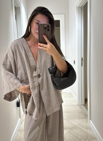 Effortless Elegance in Our Loose-Fit Long-Sleeve Top & High-Waisted Trousers Set